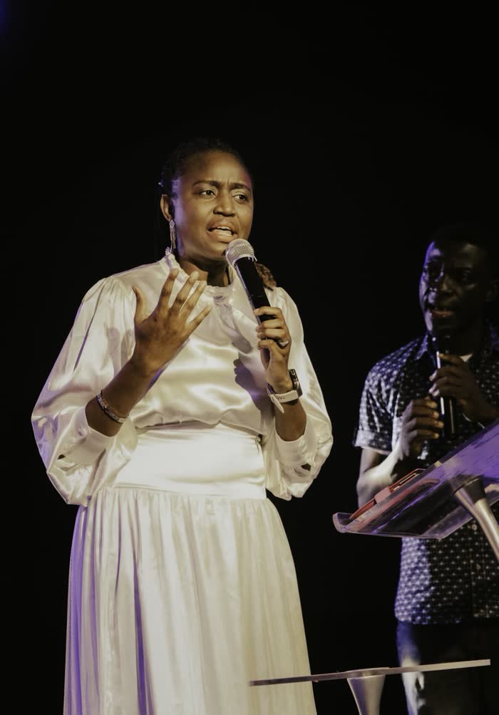 Dr. Imaobong Odutola ministering at a conference